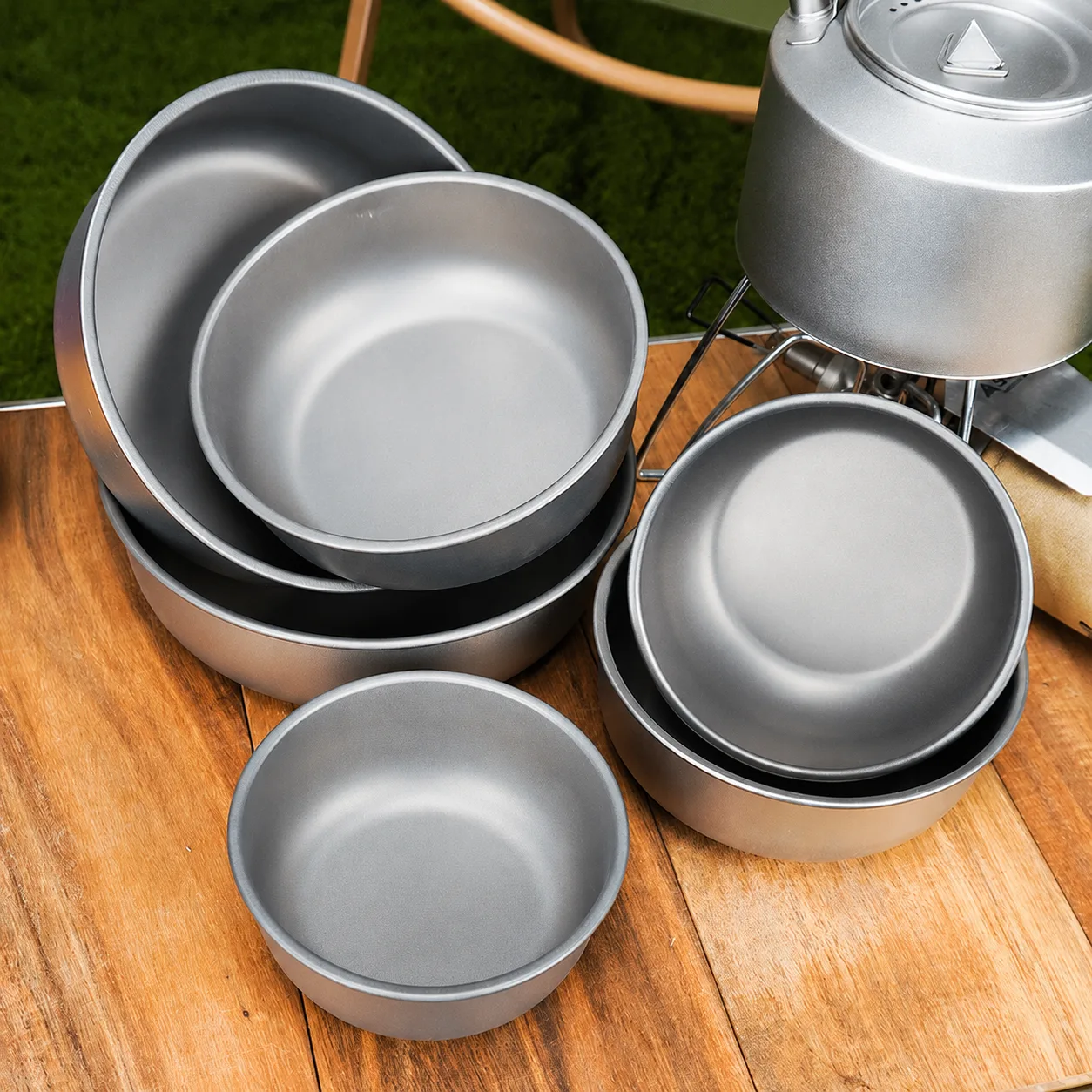 Custom titanium tableware manufacturing facilities showing precision laser logo titanium plates and specialized packaging